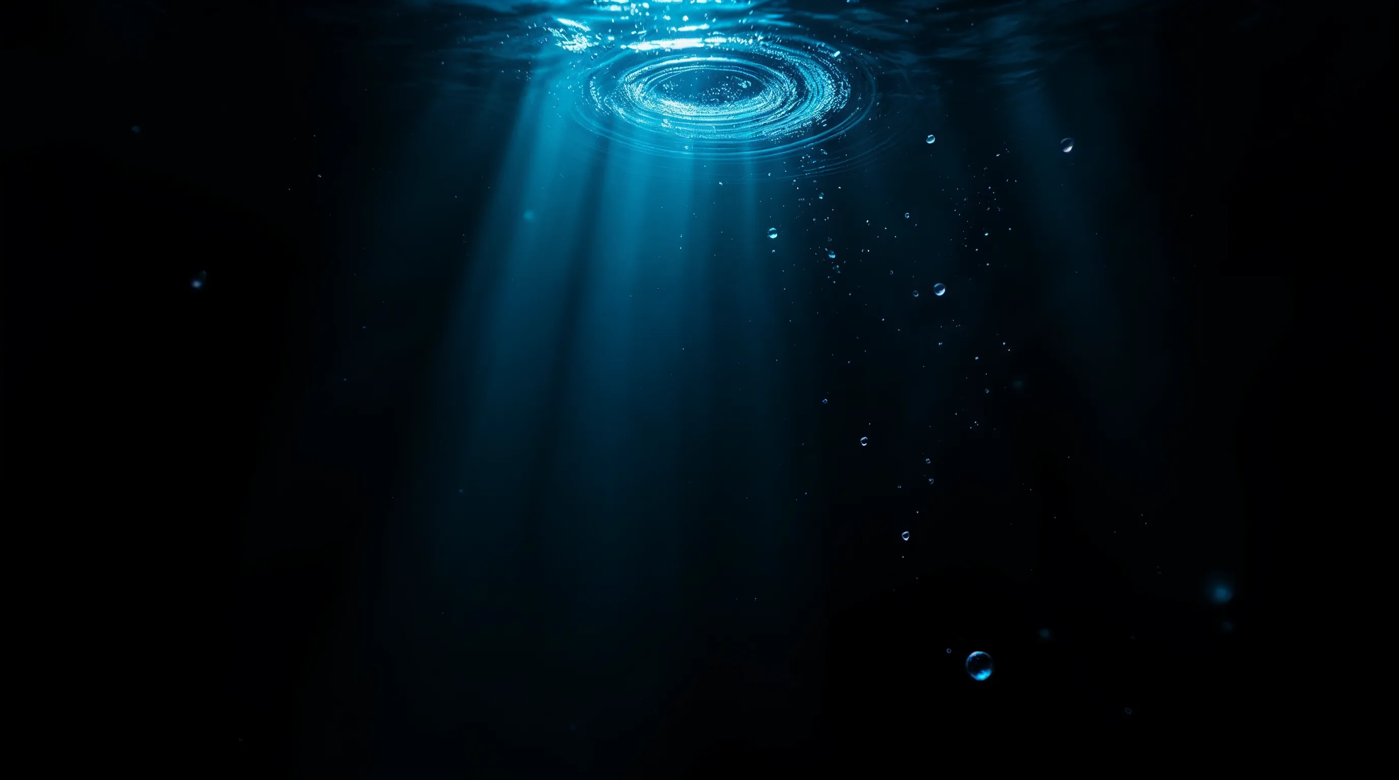 Deep ocean light rays descending into dark water, evoking DiveWallet's secure depth-themed crypto experience